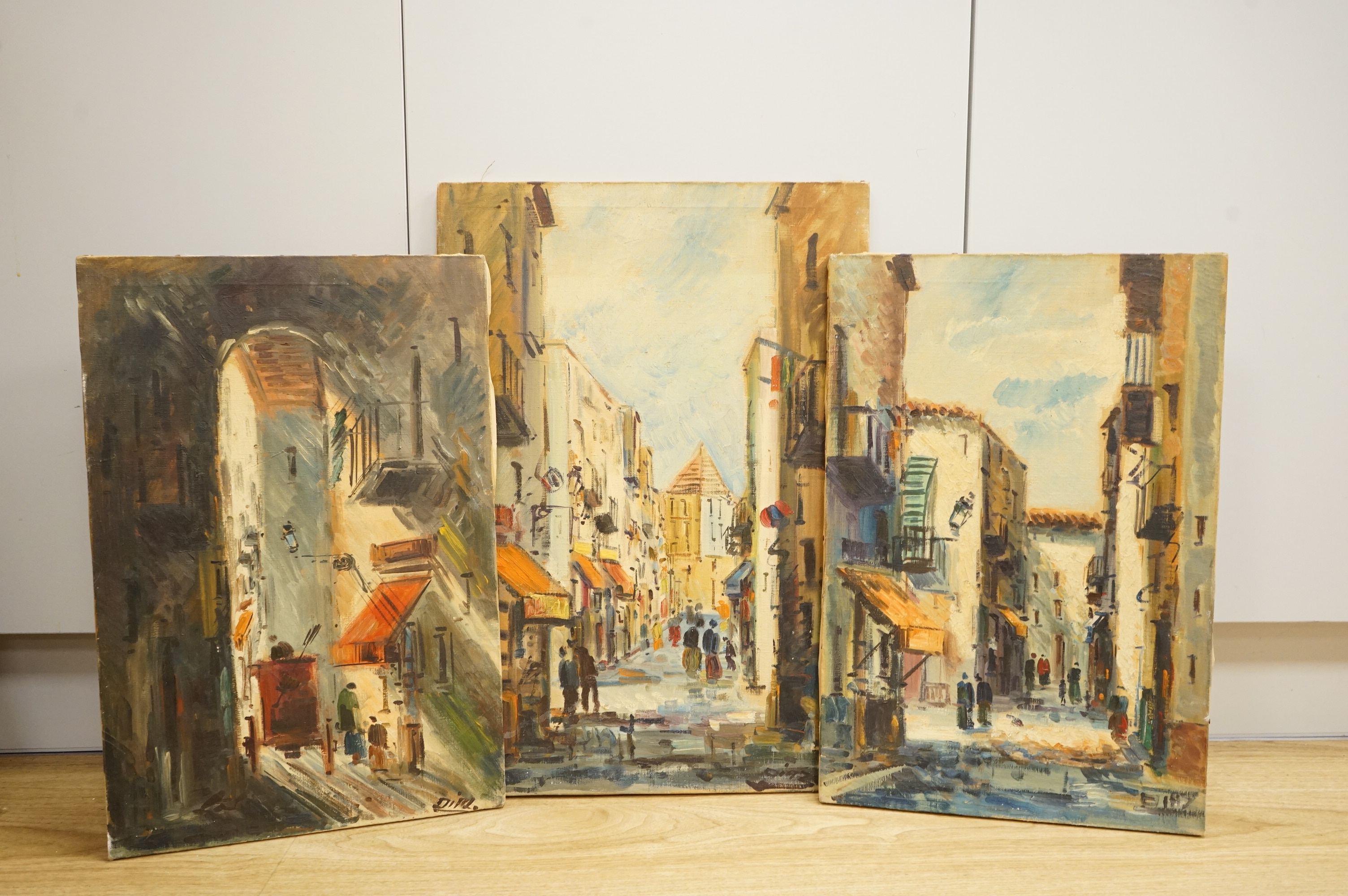 Diaz, Street scenes, each signed, three oils on canvas, unframed, largest 55 x 38cm